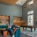 room with bar and seating and pool table