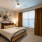 bedroom with bed and large window
