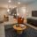 living room with a couch, coffee table, and tv